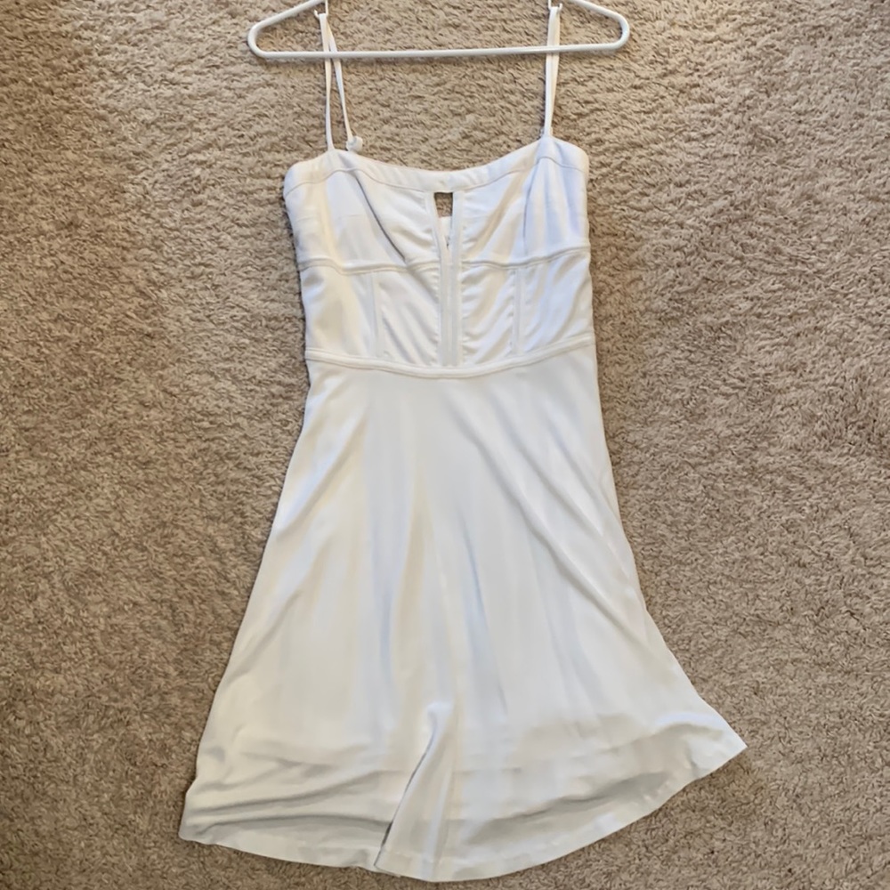 Flirty white Bebe dress